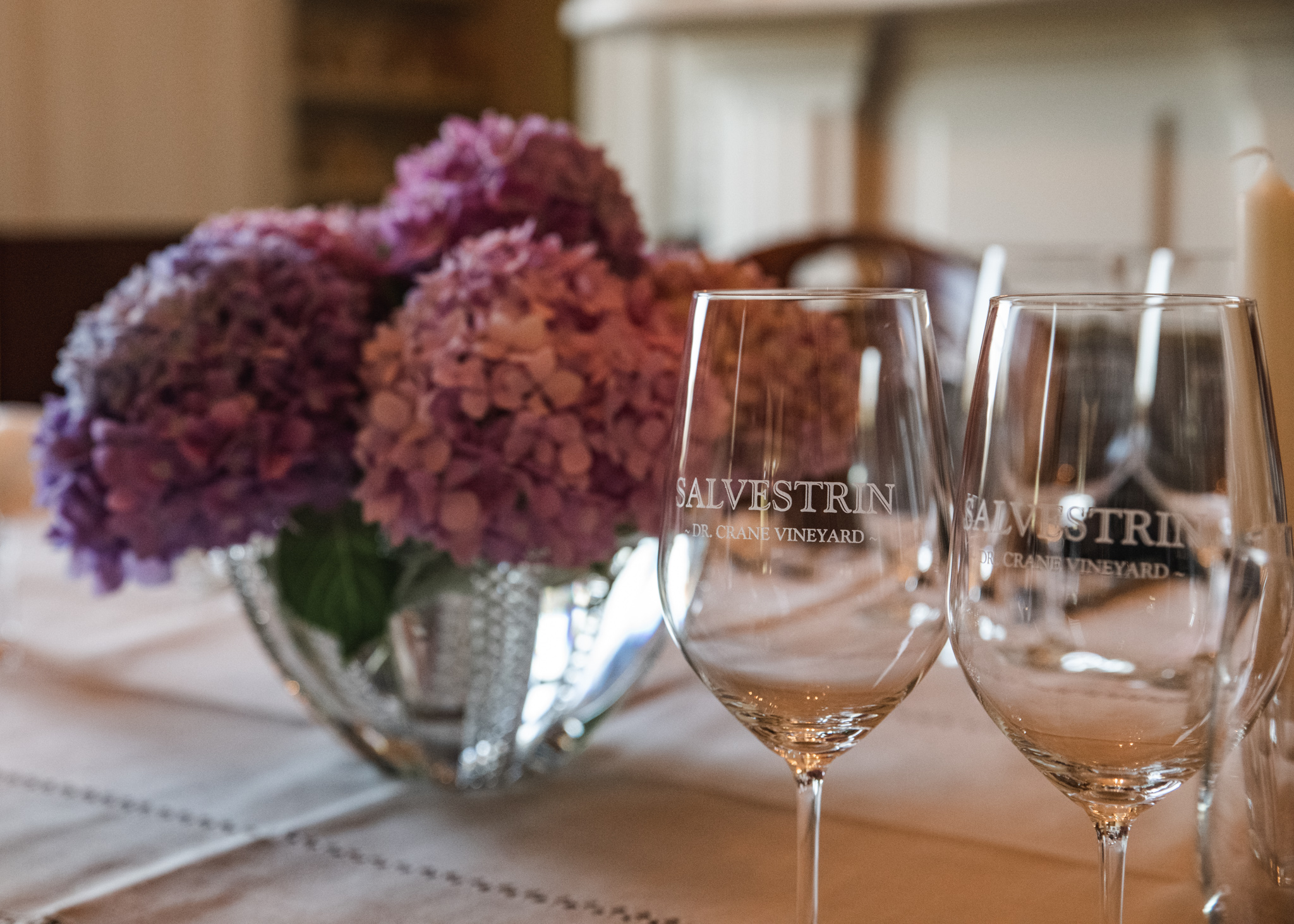Salvestrin Winery glasses on dinner table for Thomas Arvid artists dinner in Napa Valley, CA