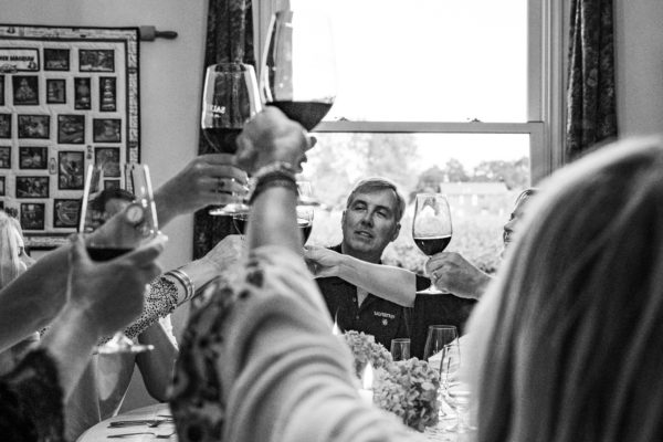 Guests giving a toast a the Thomas Arvid artists dinner at Salvestrin Winery in Napa Valley, Ca