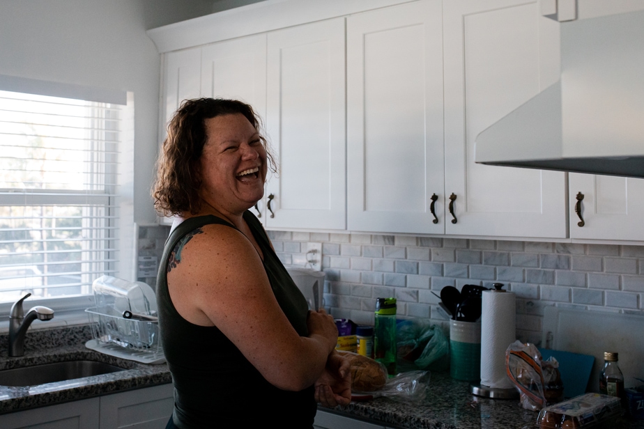 Lisa Winner laughing in a kitchen in Marathon, FL