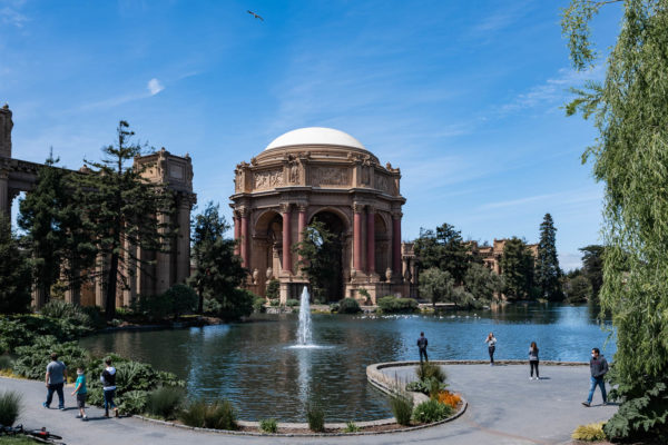 A family spends time at the Palace of Fine Arts in San Francisco, CA