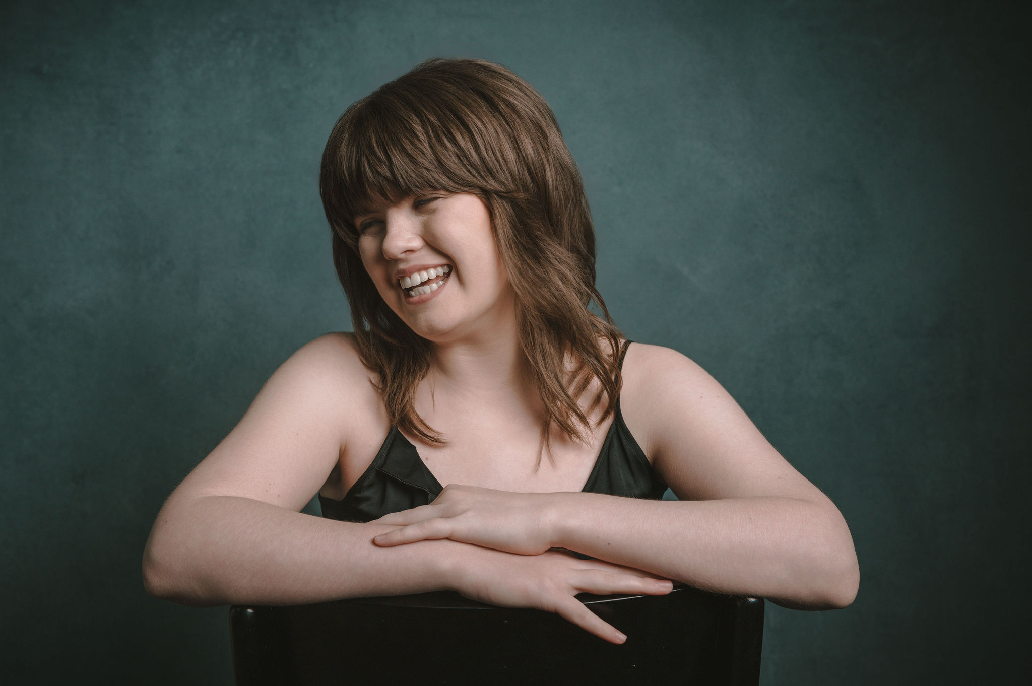 Natural, joyful senior portrait in studio photographed in the San Francisco Bay Area